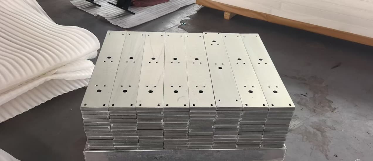 Stack of drilled metal plates
