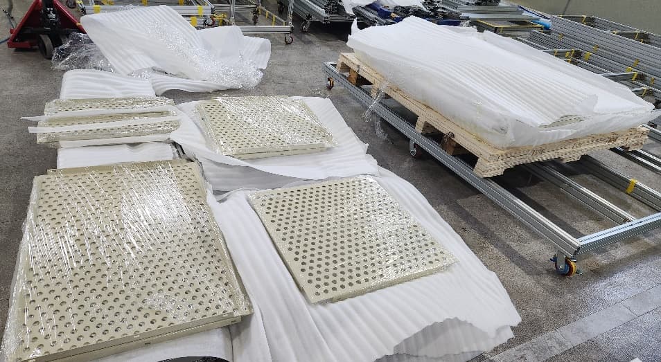 Perforated panels packaged for shipping