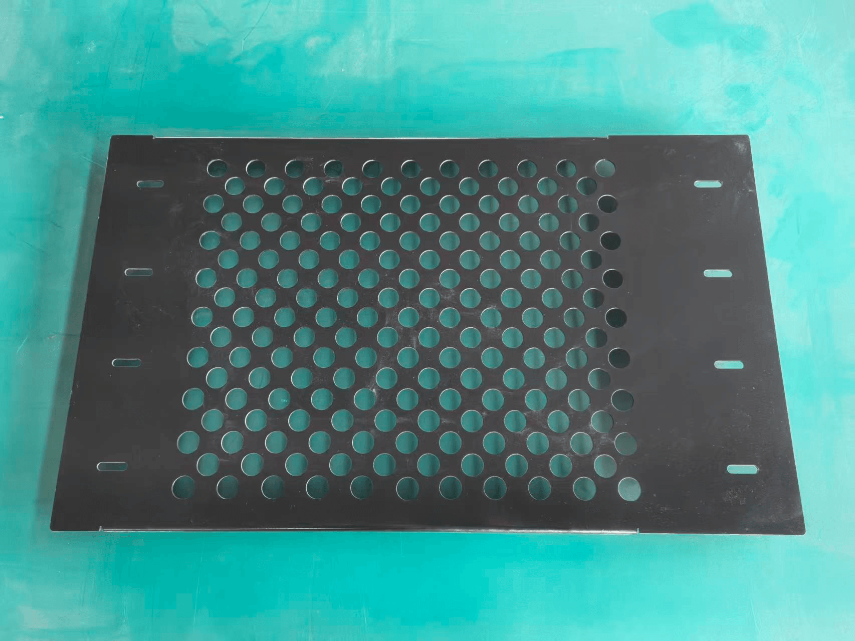 Perforated panel — black finish