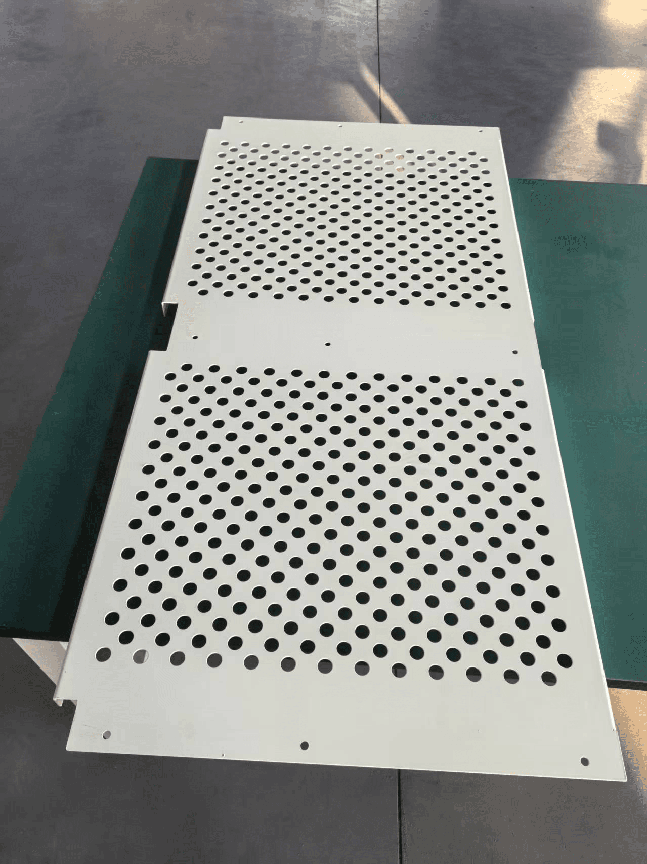 Perforated panels — matched pair